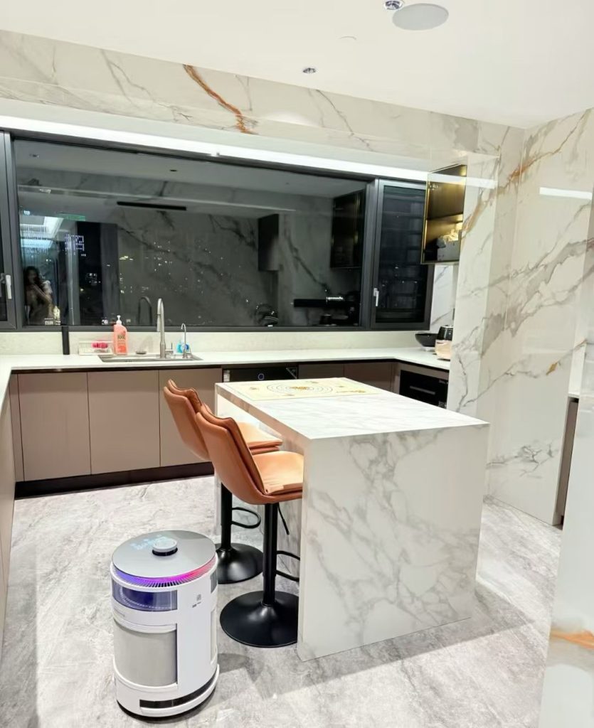 Indoor kitchen with sintered stone countertop and backsplash
