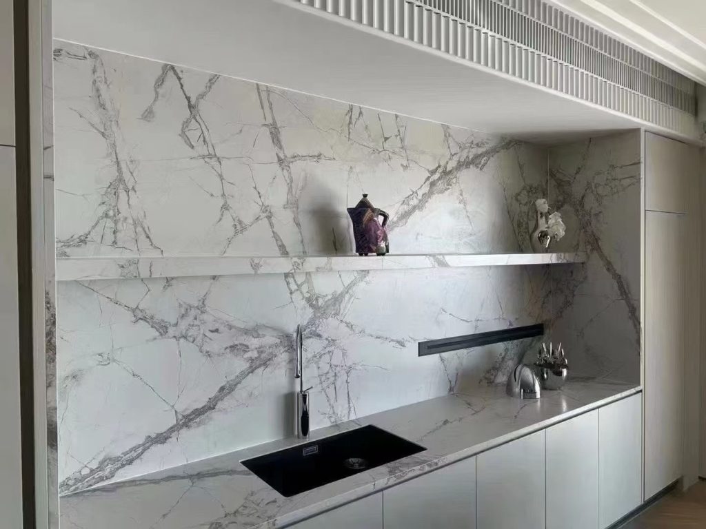 white sintered stone backsplash