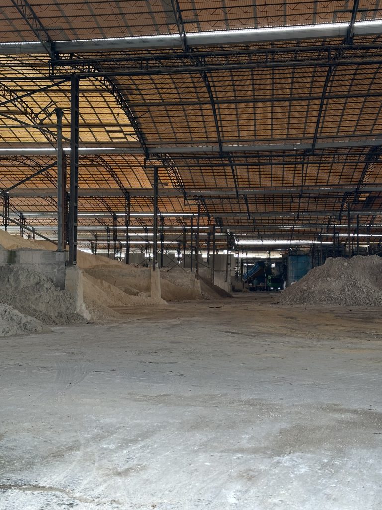 Kaolin-stacked-in-a-sintered-stone-factory-scaled
