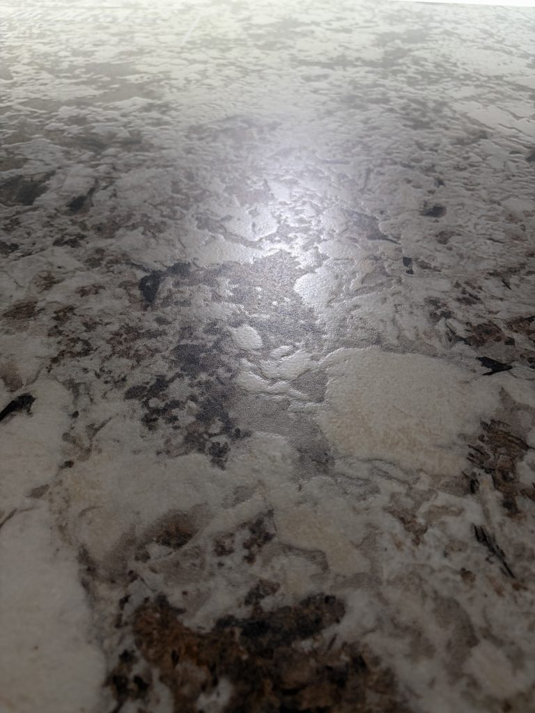 resin granule textured finish sintered stone in BJS